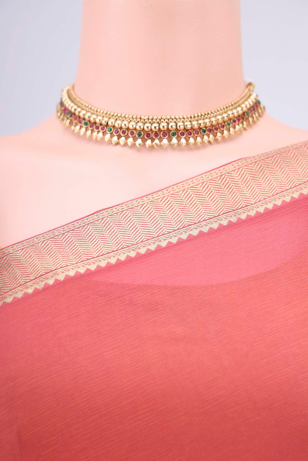 Border image of Peach Mysore Chiffon Saree with Plain Body and Zari Border. 