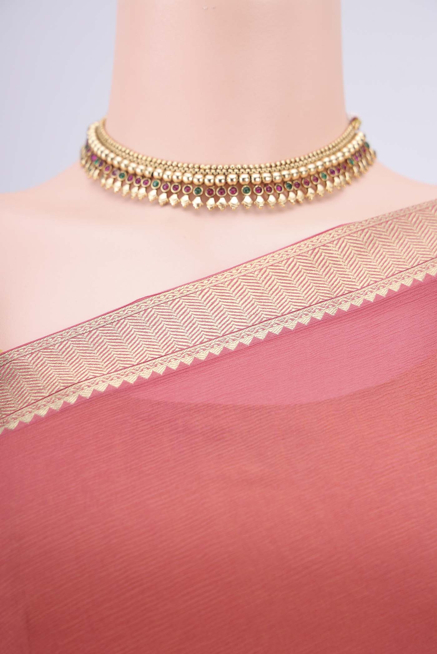 Border image of Peach Mysore Chiffon Saree with Plain Body and Zari Border. 