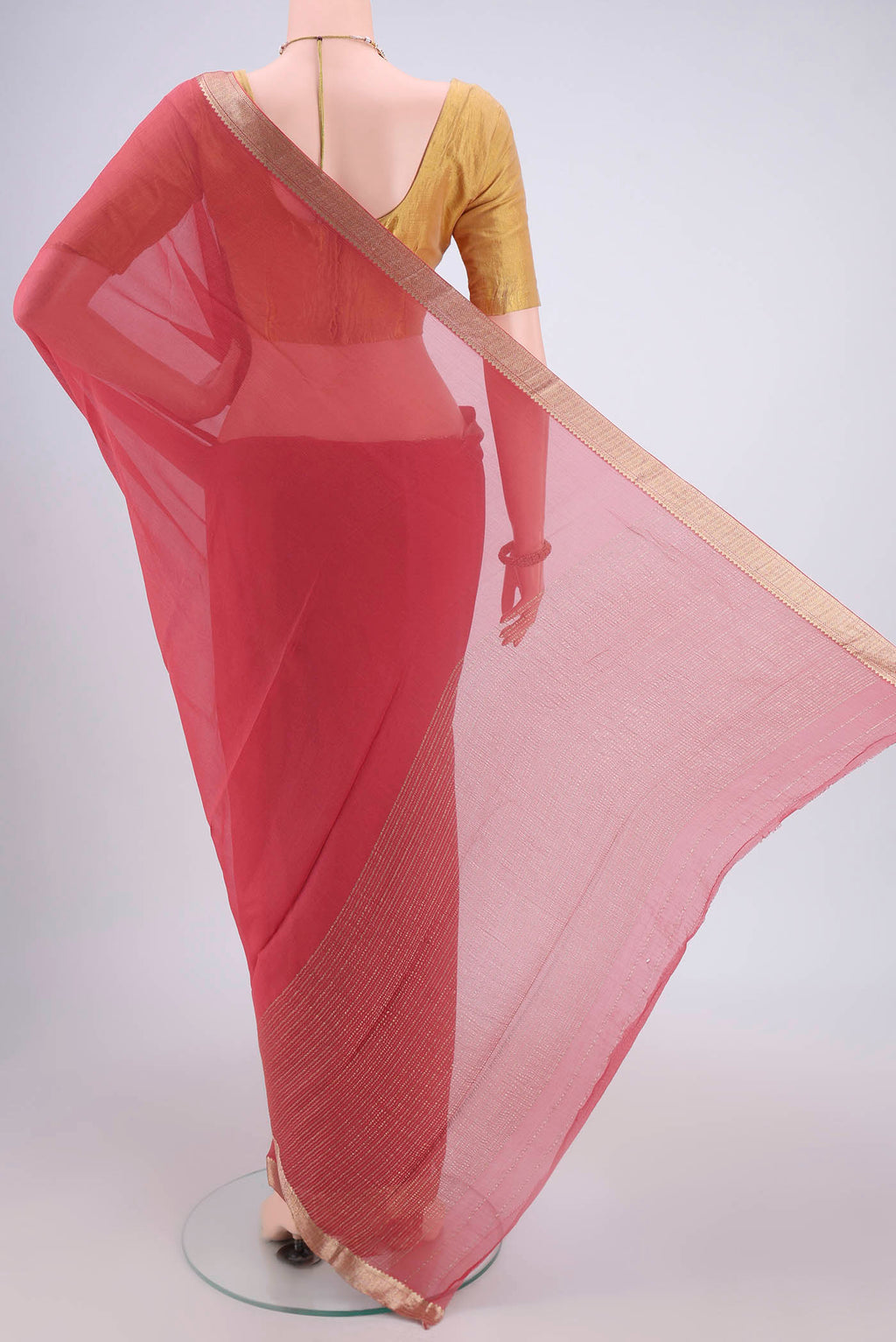 Flat view of Peach Mysore Chiffon Saree with Plain Body and Zari Border. 