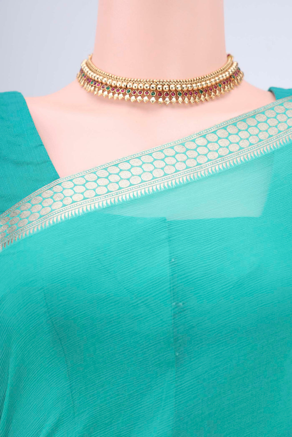 Border image of Sea Green Mysore Chiffon Saree with Plain Body and Zari Border. 