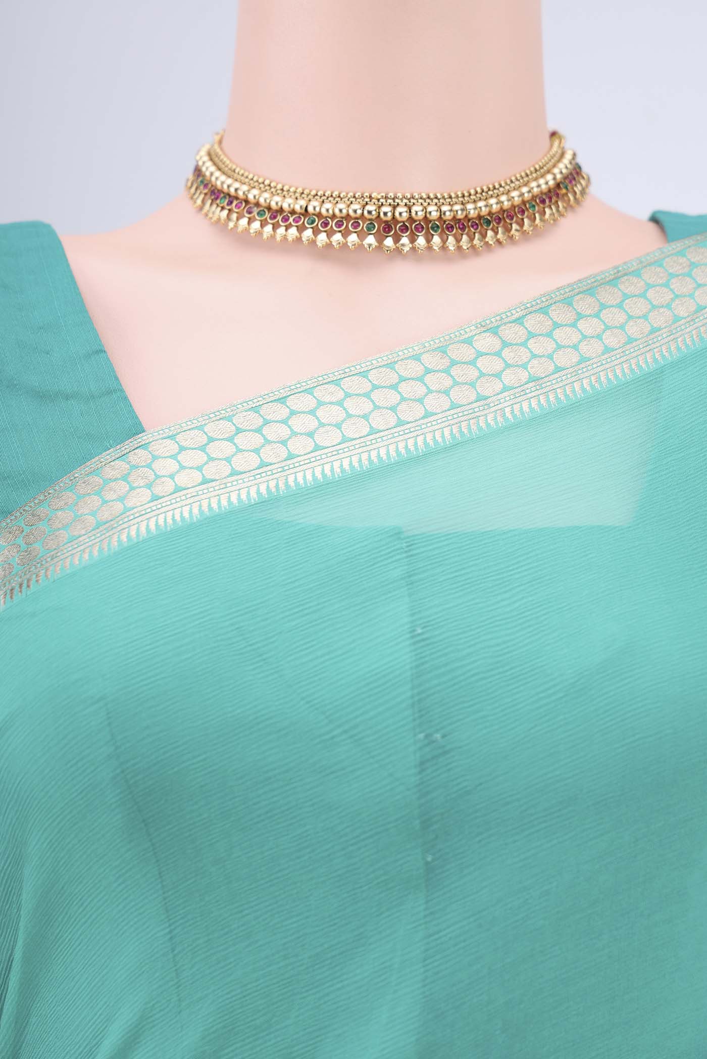 Border image of Sea Green Mysore Chiffon Saree with Plain Body and Zari Border. 