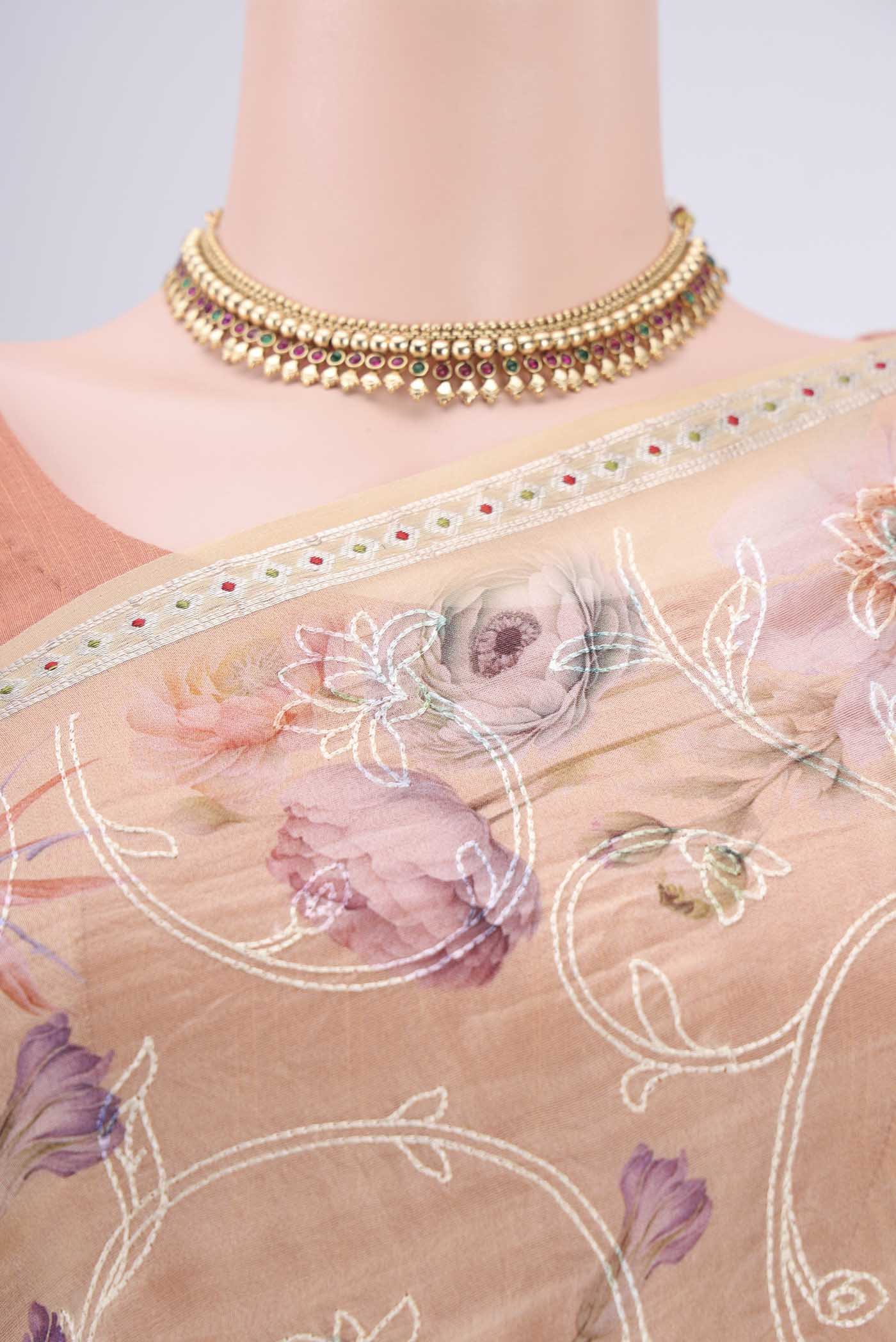 Border image of Beige Organza Silk Saree with Embroidery on the body and Zari Border. 