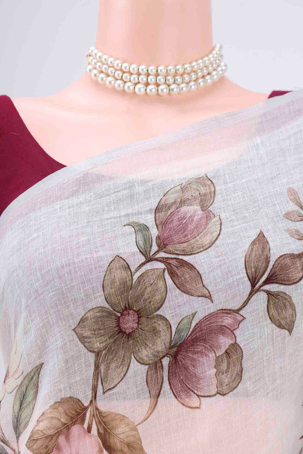 Border image of Off White Linen Saree with Floral Print on the body and Zari Border. 