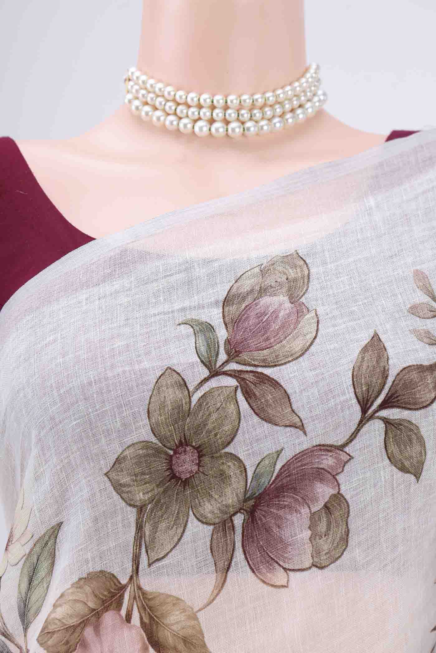Border image of Off White Linen Saree with Floral Print on the body and Zari Border. 