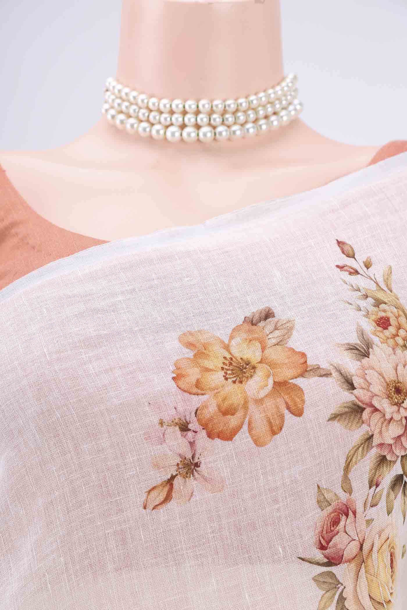 Border image of Off White Linen Saree with Floral Print on the body and Zari Border. 
