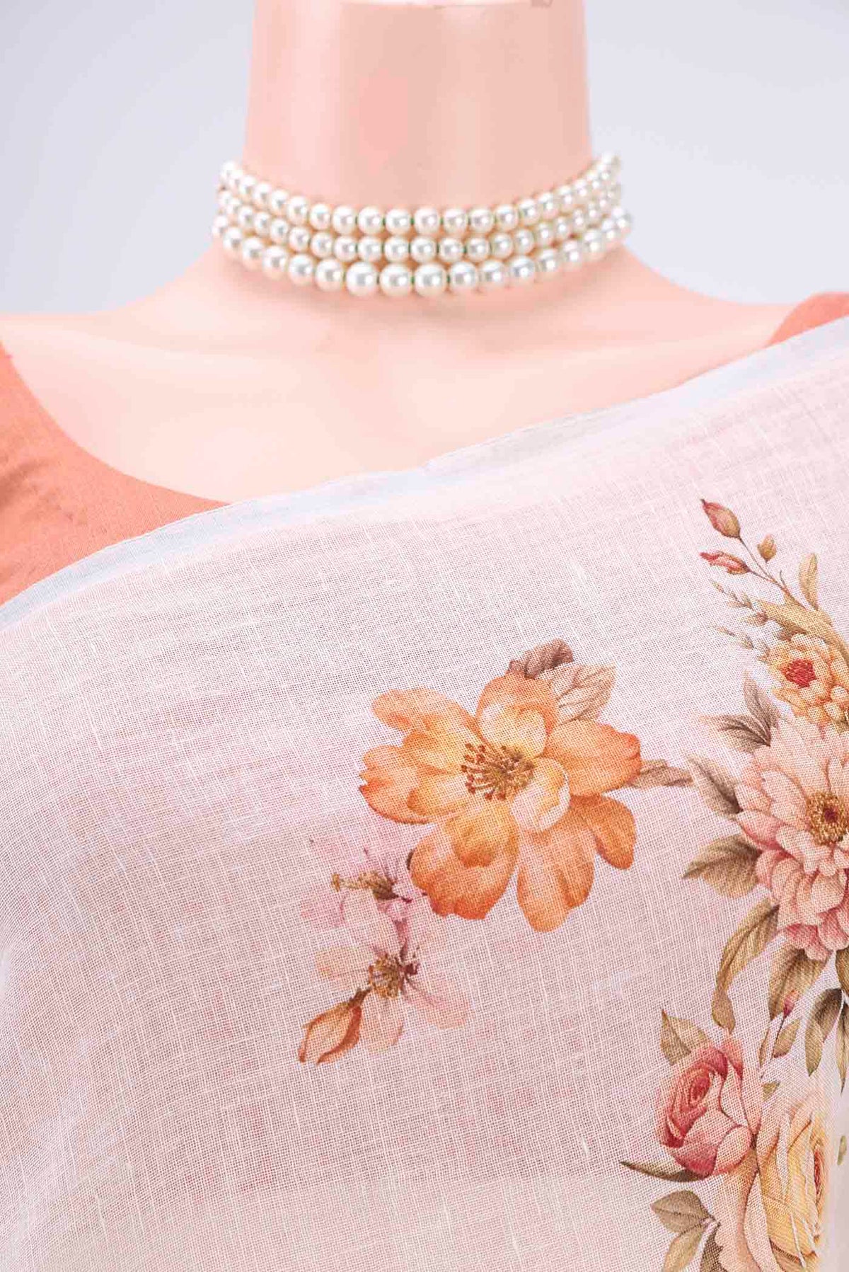 Border image of Off White Linen Saree with Floral Print on the body and Zari Border. 