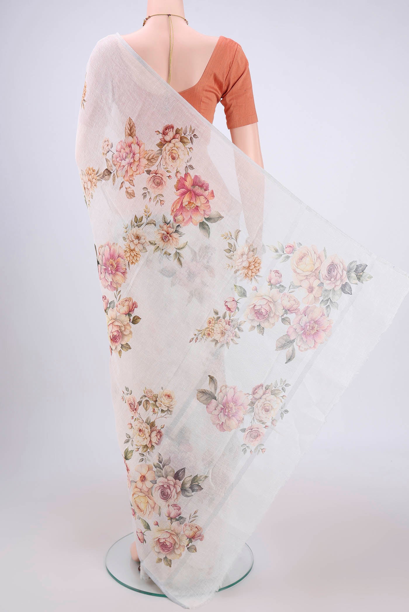 Flat view of Off White Linen Saree with Floral Print on the body and Zari Border. 