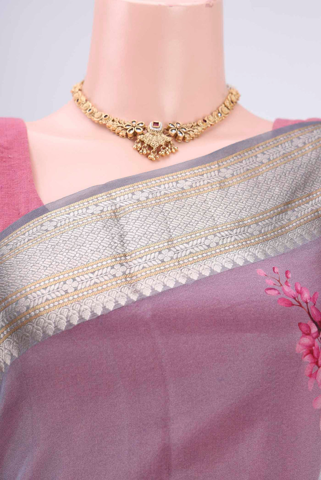 Border image of Blue Grey Organza Silk Saree with Printed design on the body and Zari Border. 