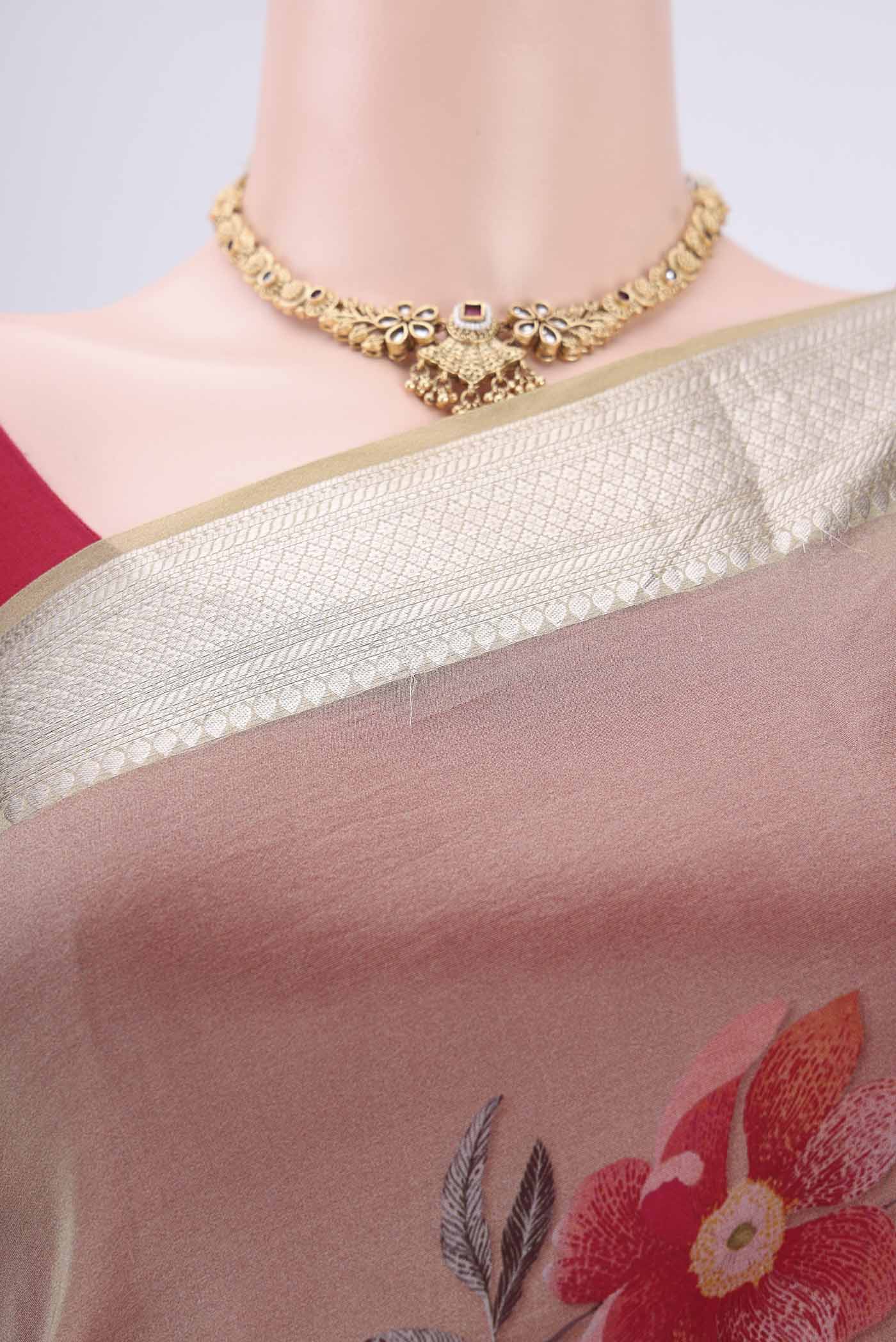 Border image of Sage Green Organza Silk Saree with Printed design on the body and Zari Border. 