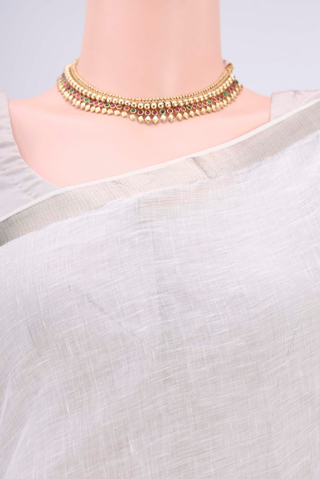 Border image of Off White Linen Saree with Plain Body and Zari Border. 