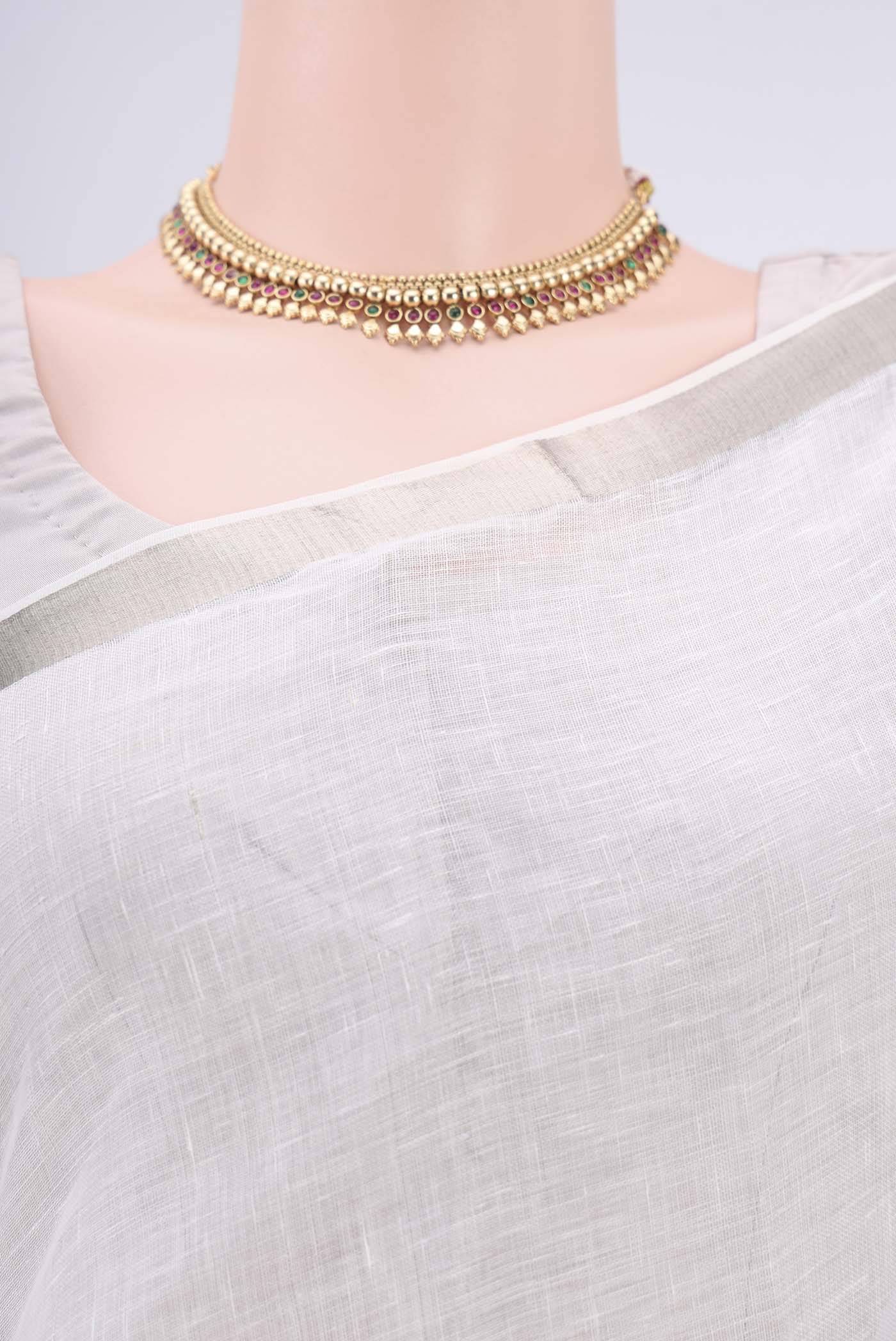 Border image of Off White Linen Saree with Plain Body and Zari Border. 