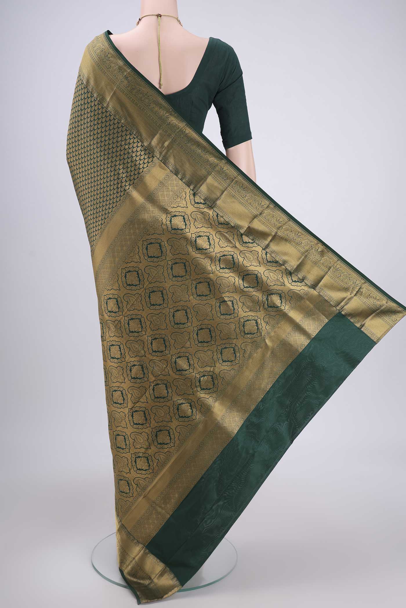 Flat view of Bottle Green Bangalore Silk Saree with Zari Brocade on the body and Zari Border. 