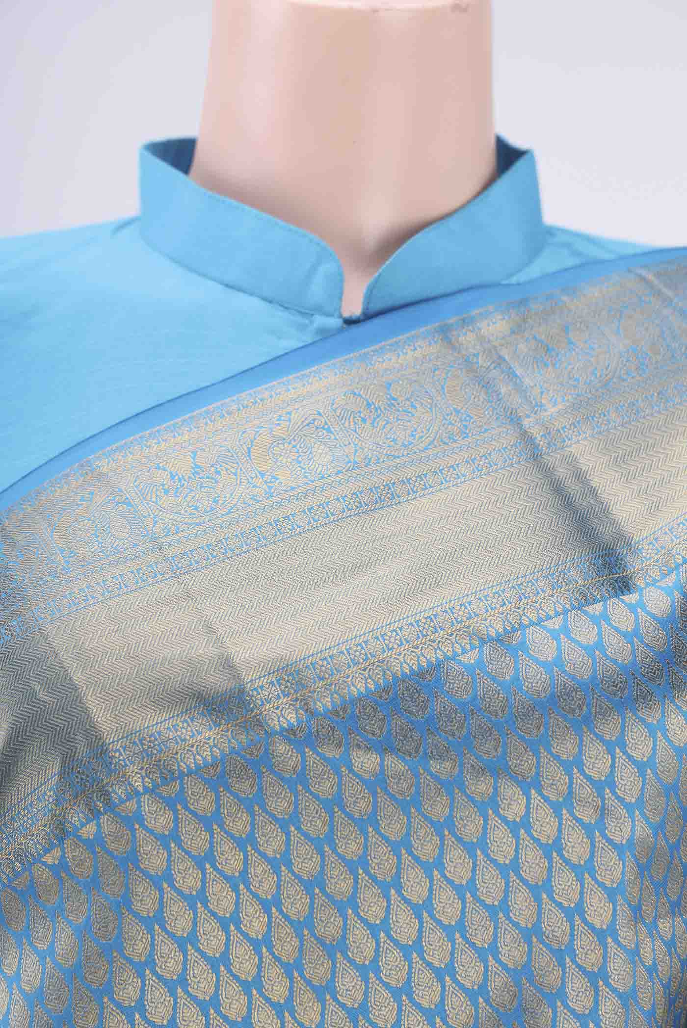 Border image of Blue Bangalore Silk Saree with Zari Brocade on the body and Zari Border. 
