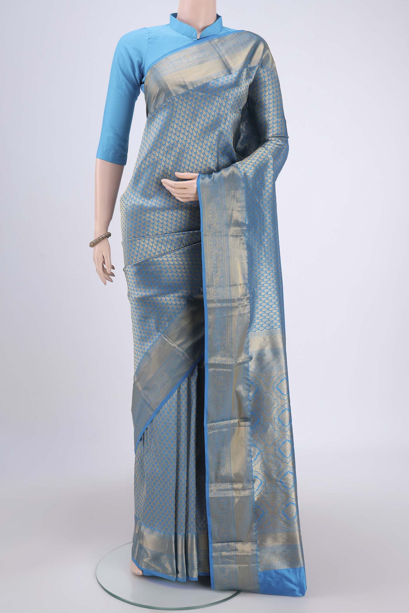 Blue Bangalore Silk Saree with Zari Brocade on the body and Zari Border.  displayed on a mannequin