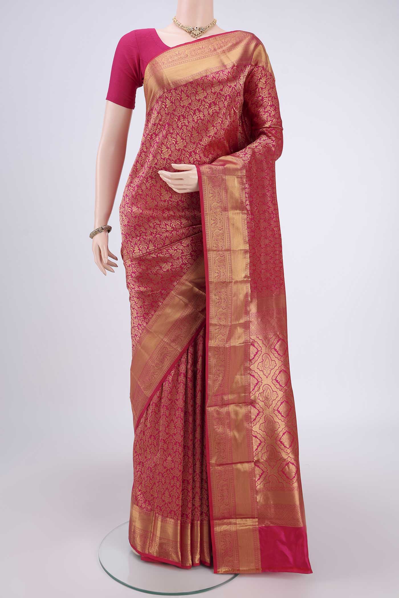 Pink Bangalore Silk Saree with Zari Brocade on the body and Zari Border.  displayed on a mannequin