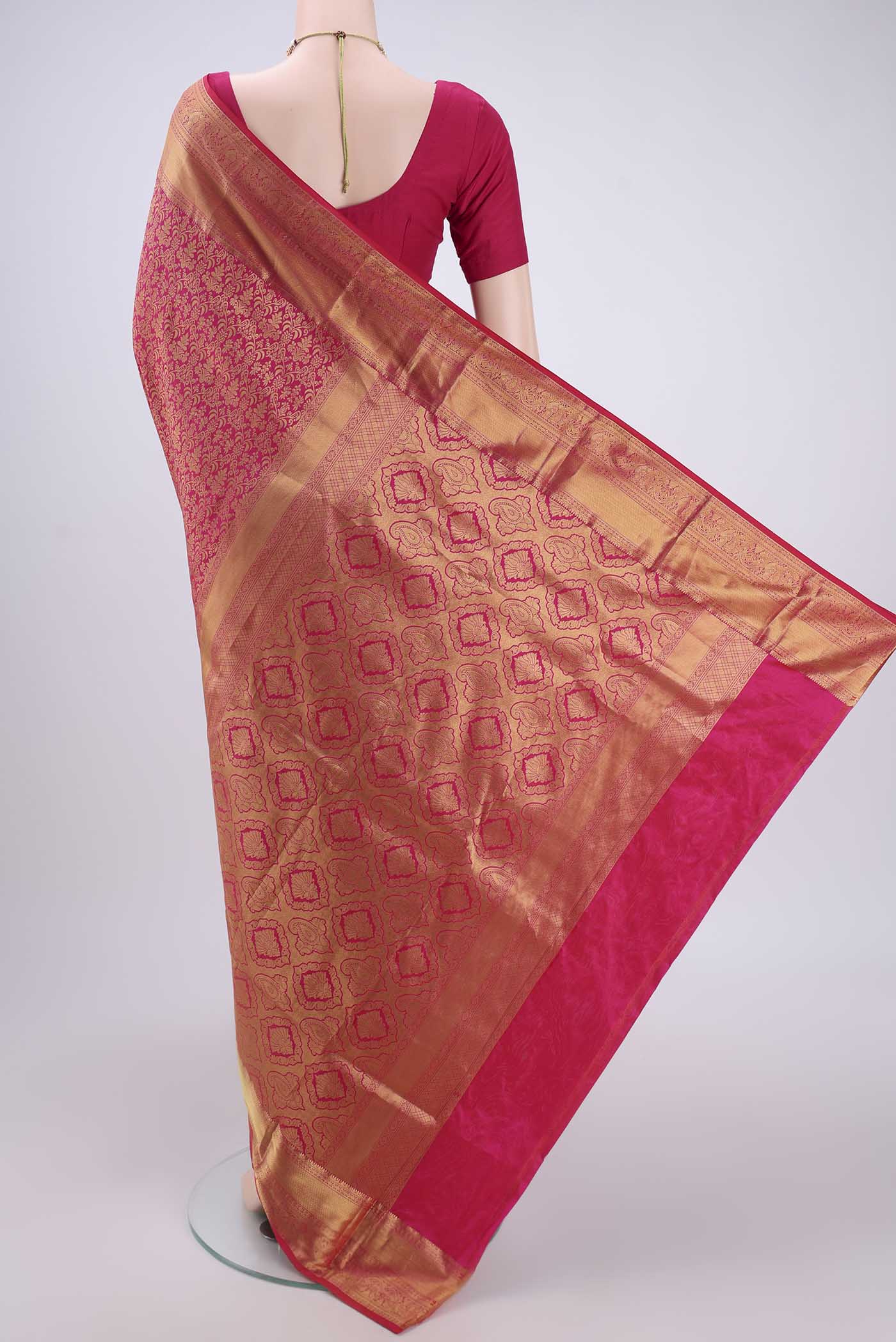 Flat view of Pink Bangalore Silk Saree with Zari Brocade on the body and Zari Border. 