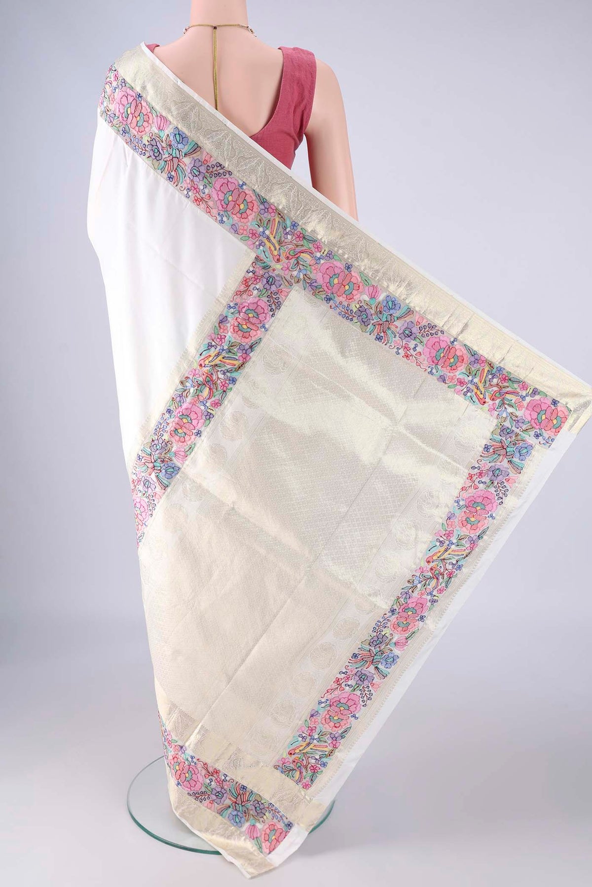 Flat view of White Kanjivaram Silk Saree with Plain Body and Zari Border. 