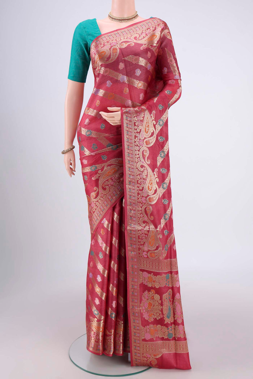 Pink Banarasi Tussar Silk Saree with Zari Brocade on the body and Zari And Thread Border.  displayed on a mannequin