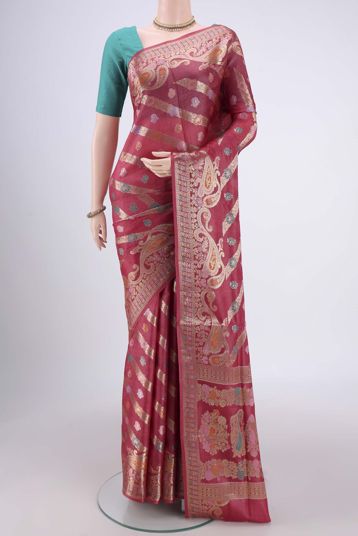 Pink Banarasi Tussar Silk Saree with Zari Brocade on the body and Zari And Thread Border.  displayed on a mannequin