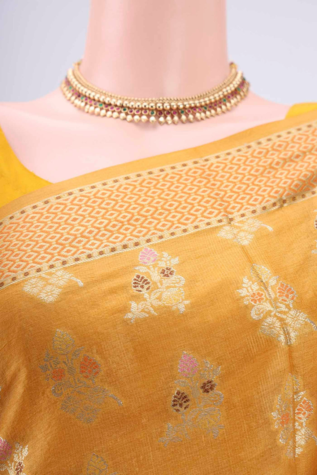 Border image of Mustard Banarasi Raw Silk Saree with Zari And Thread Butta on the body and Zari And Thread Border. 