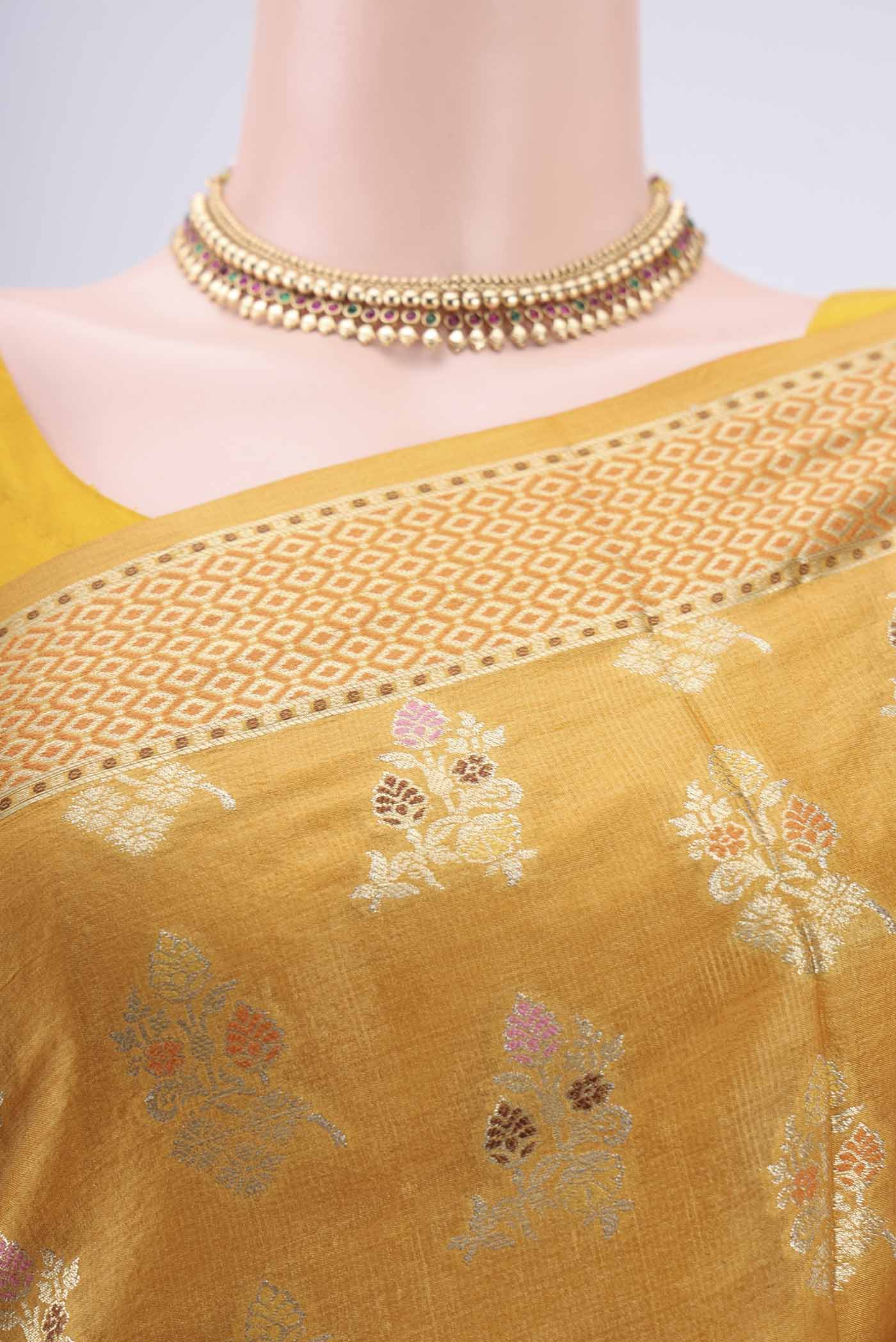 Border image of Mustard Banarasi Raw Silk Saree with Zari And Thread Butta on the body and Zari And Thread Border. 