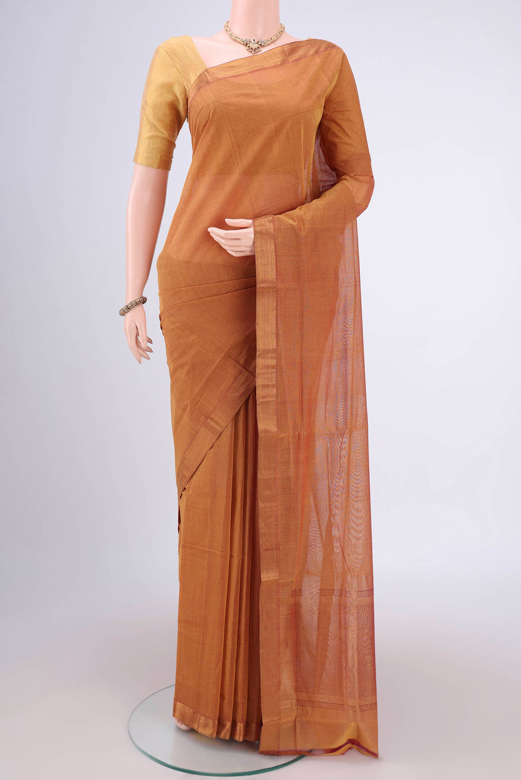 Mustard Mangalagiri Cotton Saree with Plain Body and Zari Border.  displayed on a mannequin