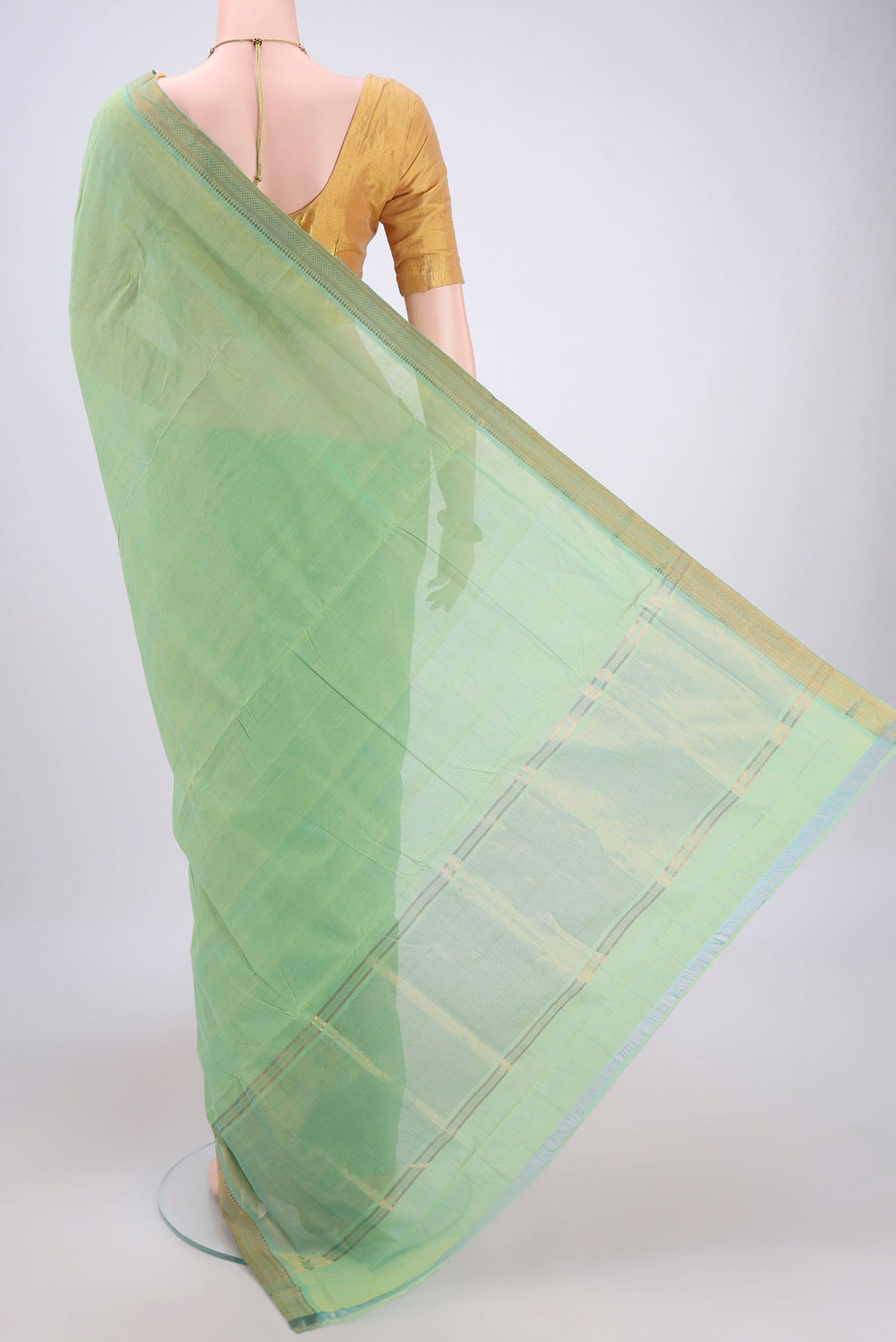 Flat view of Acid Green Mangalagiri Cotton Saree with Plain Body and Zari Border. 