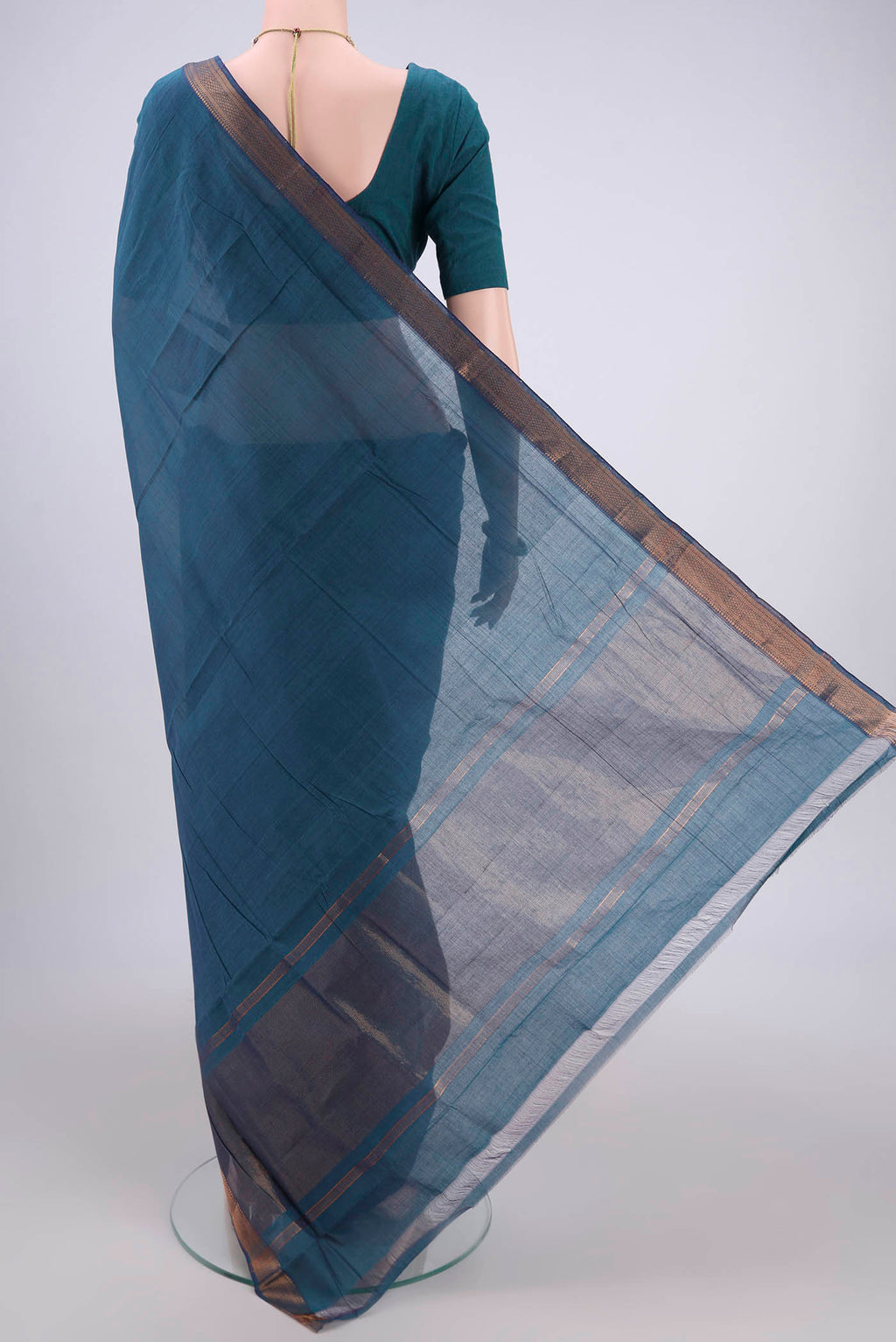 Flat view of Peacock Blue Mangalagiri Cotton Saree with Plain Body and Zari Border. 