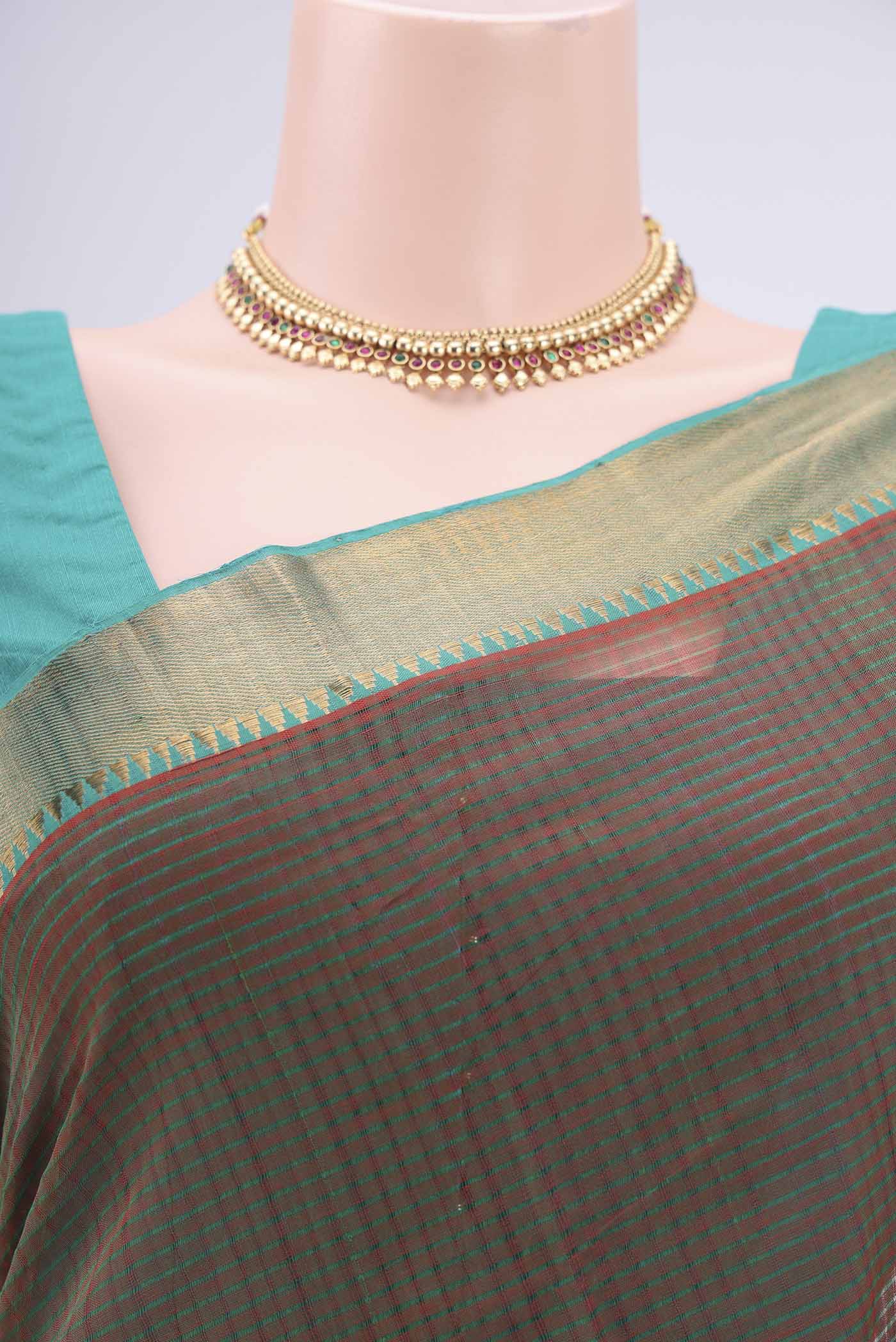 Border image of Green Mangalagiri Cotton Saree with Plain Body and Zari Border. 