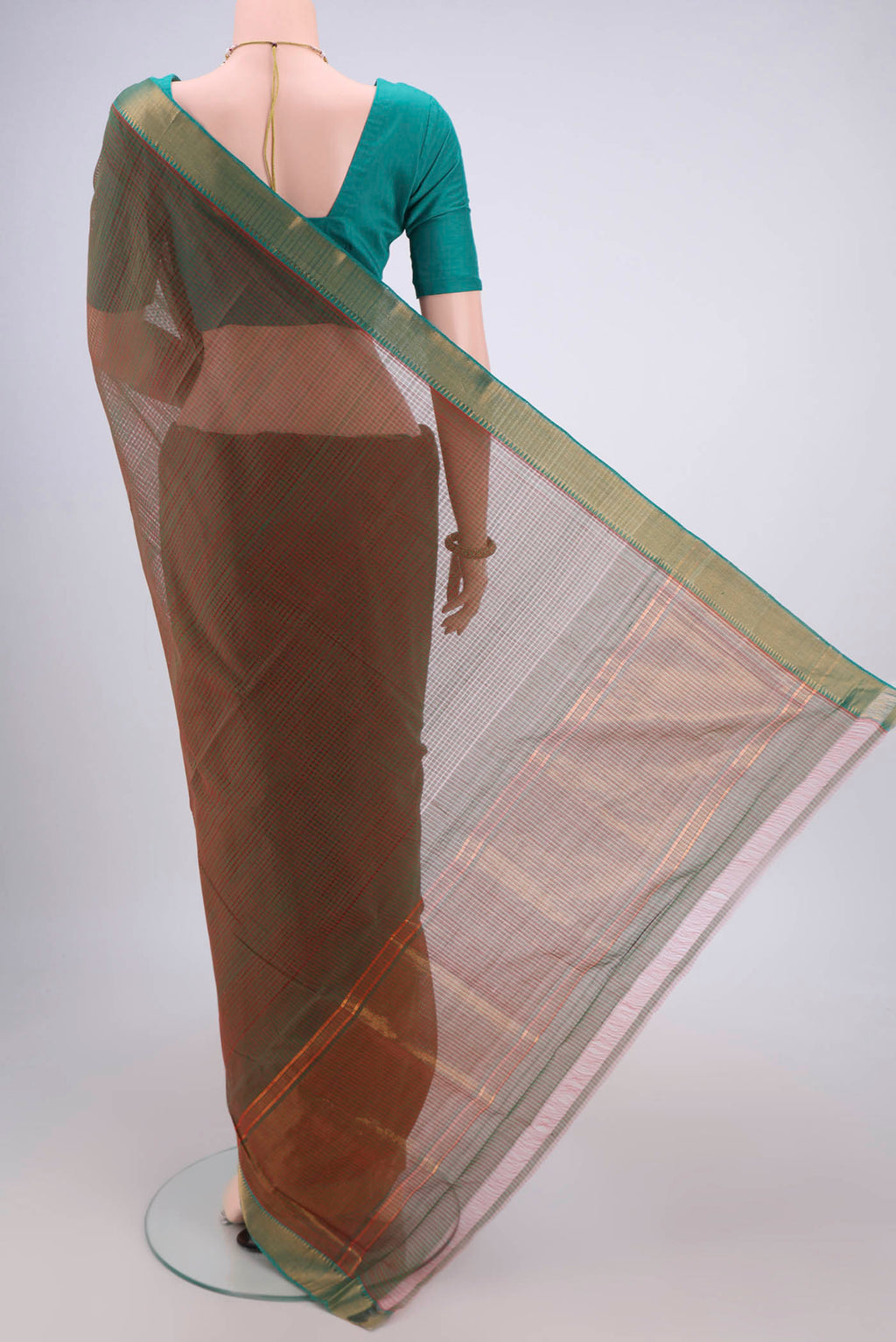 Flat view of Green Mangalagiri Cotton Saree with Plain Body and Zari Border. 
