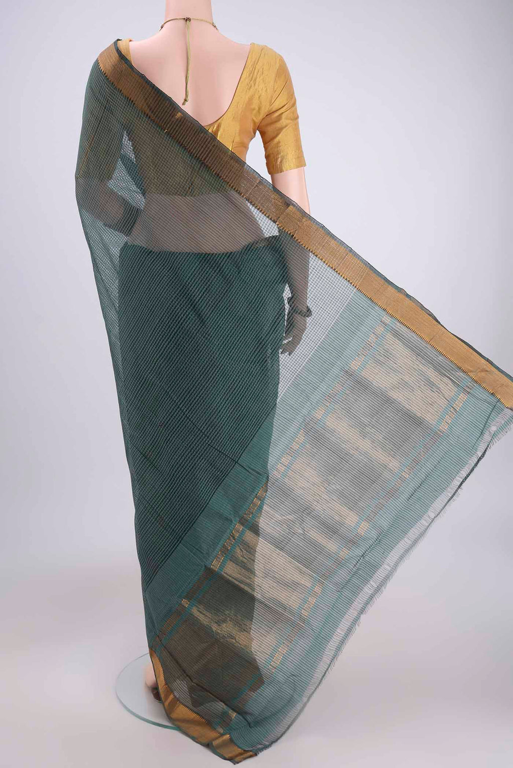 Flat view of Davys Grey Mangalagiri Cotton Saree with Plain Body and Zari Border. 