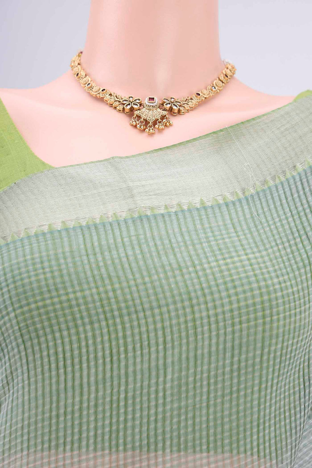 Border image of Sage Green Mangalagiri Cotton Saree with Plain Body and Zari Border. 
