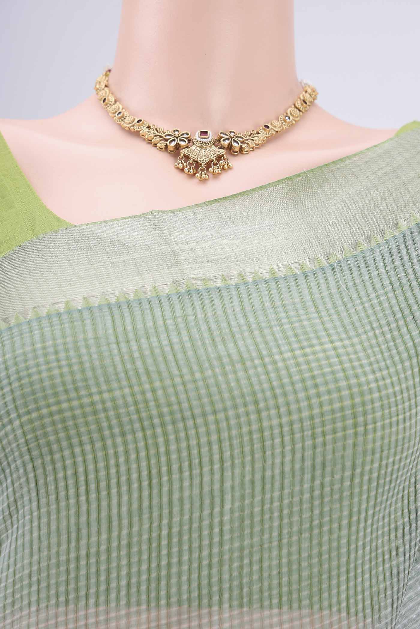 Border image of Sage Green Mangalagiri Cotton Saree with Plain Body and Zari Border. 