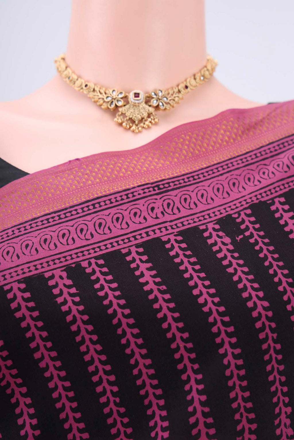 Border image of Black Maheshwari Silk Cotton Saree with Stripes on the body and Zari Border. 