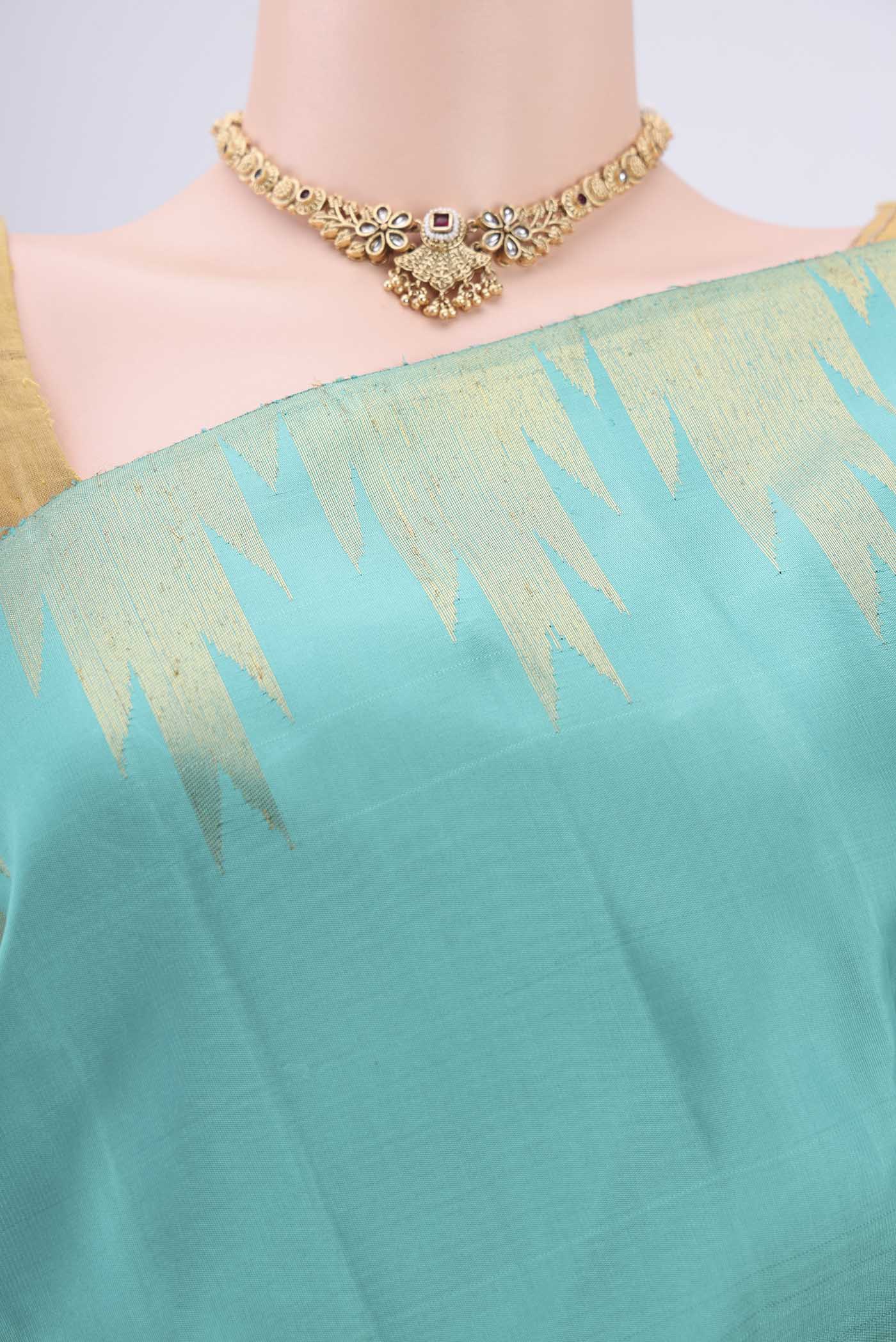 Border image of Sea Green Dual Tone Kanchipuram Silk Saree with Plain Body and Temple Border. 