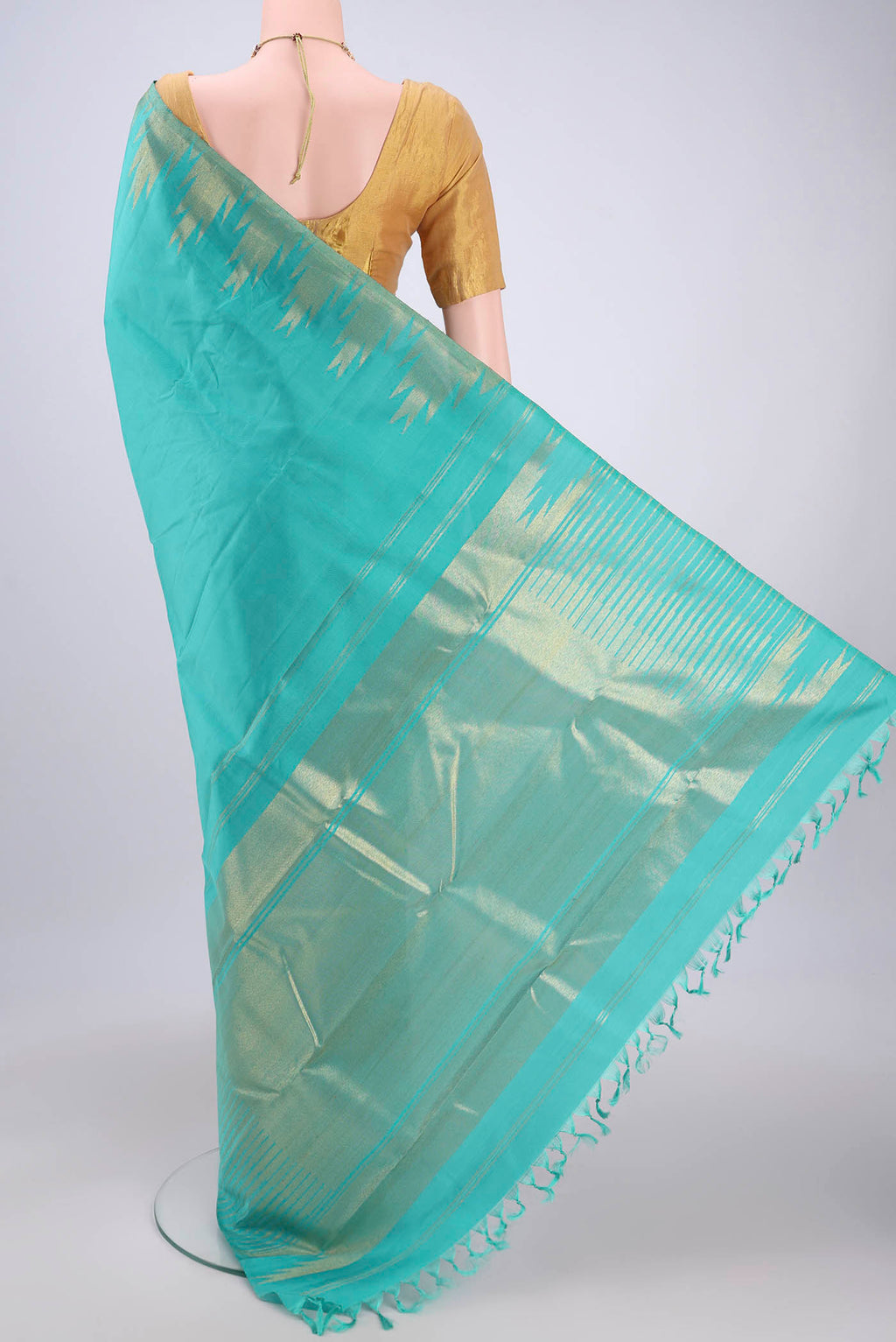 Flat view of Sea Green Dual Tone Kanchipuram Silk Saree with Plain Body and Temple Border. 