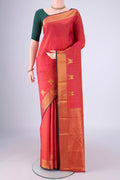 Coral Dual Tone Kanjivaram Silk Saree with Stripes on the body and Zari Border.  displayed on a mannequin