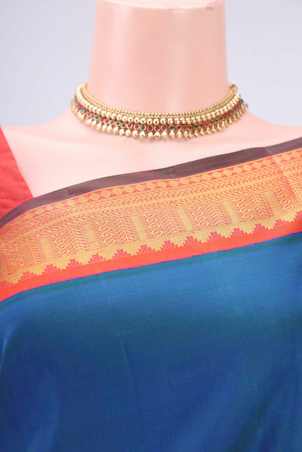 Border image of Pure Silk Pure Zari Peacock Blue Kanjivaram Saree with Plain Body and Zari Border. 