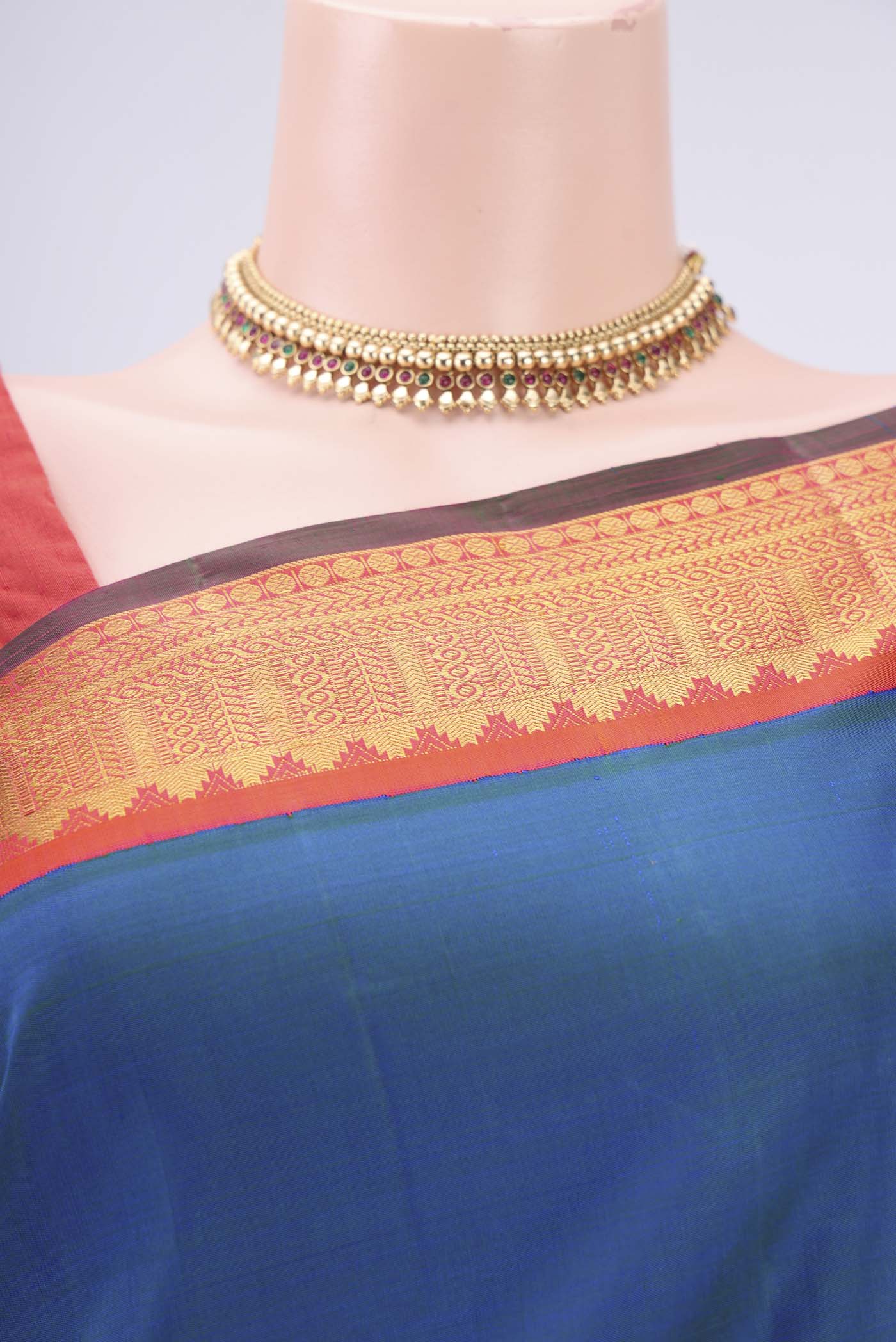 Border image of Pure Silk Pure Zari Peacock Blue Kanjivaram Saree with Plain Body and Zari Border. 