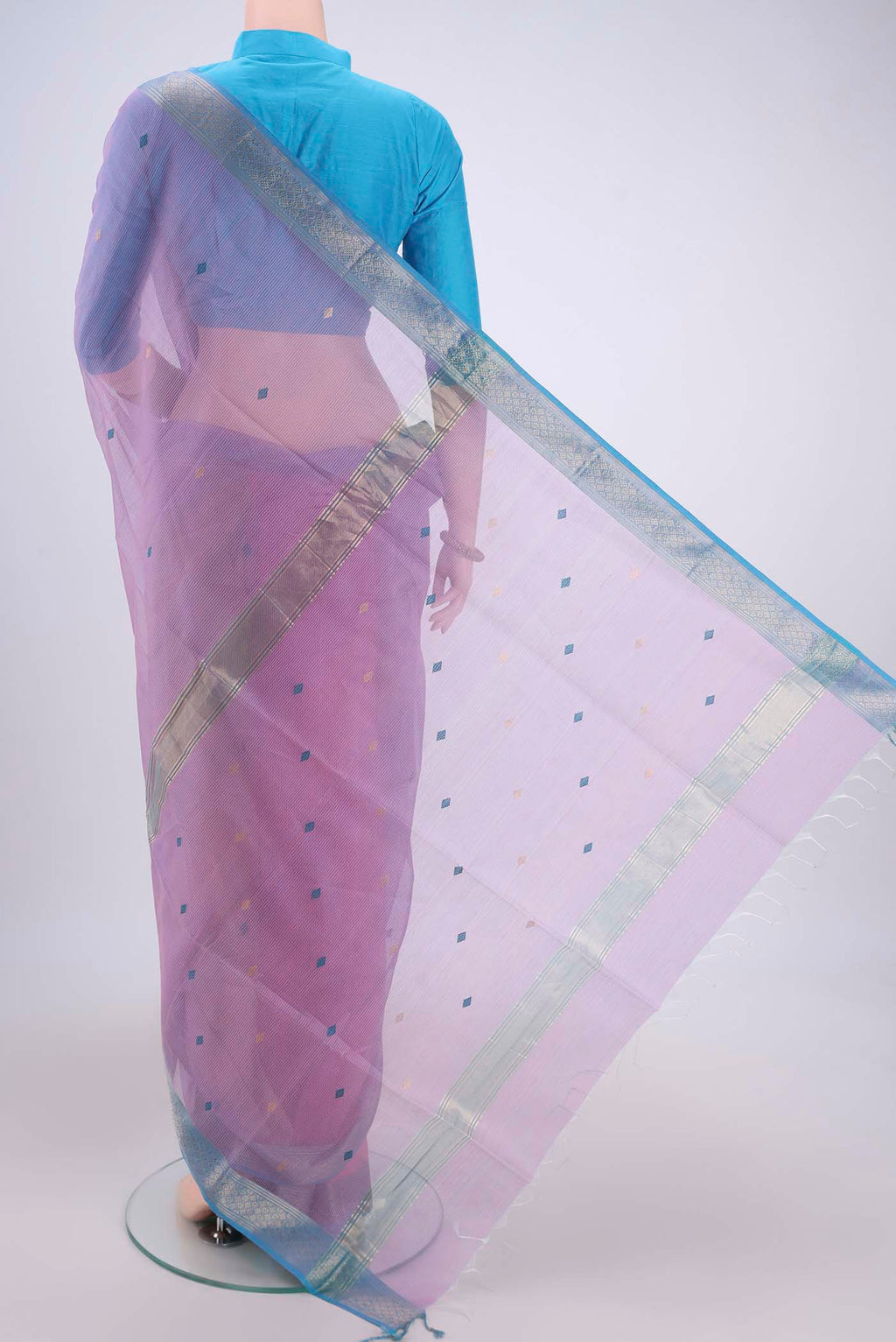 Flat view of Pink Maheshwari Silk Cotton Saree with Zari And Thread Butta on the body and Zari Border. 