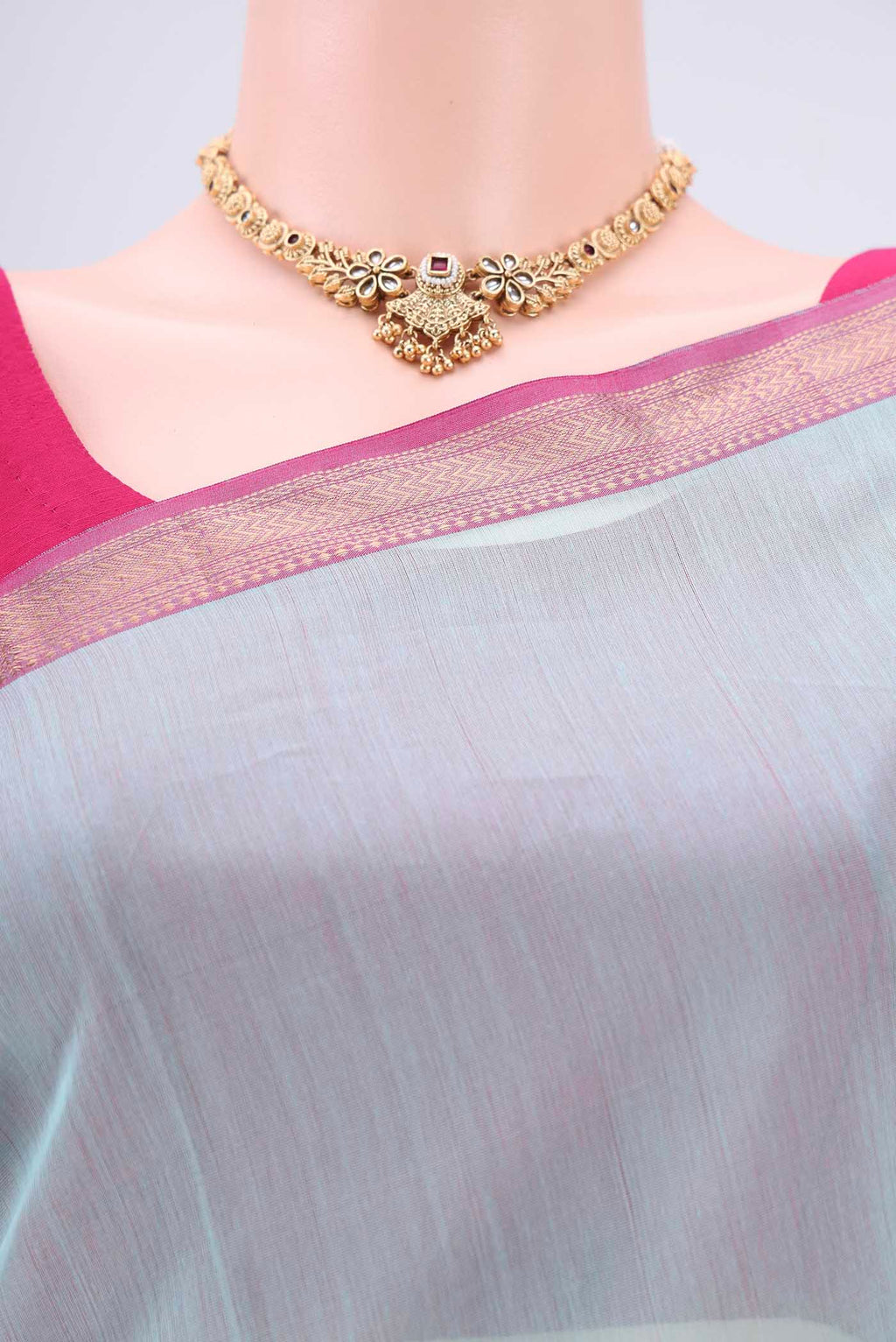 Border image of Turquoise Maheshwari Silk Cotton Saree with Zari Butta on the body and Zari Border. 
