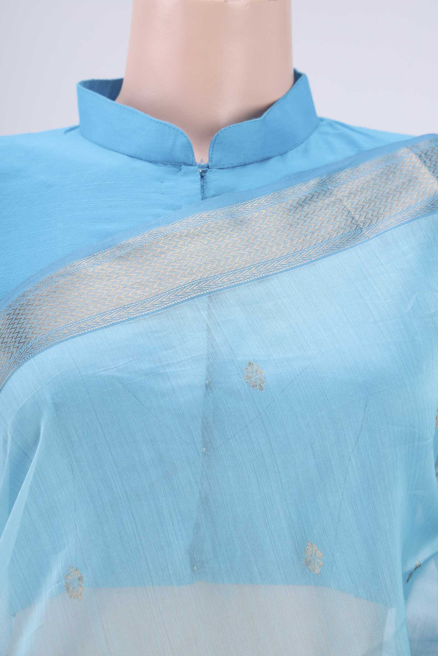 Border image of Sky Blue Maheshwari Silk Cotton Saree with Zari Butta on the body and Zari Border. 