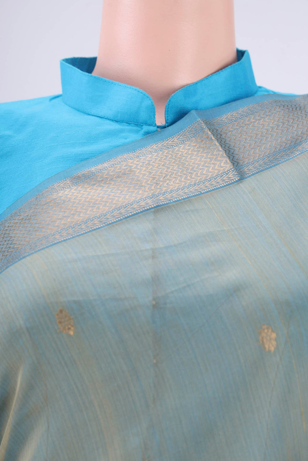 Border image of Sage Green Maheshwari Silk Cotton Saree with Zari Butta on the body and Zari Border. 