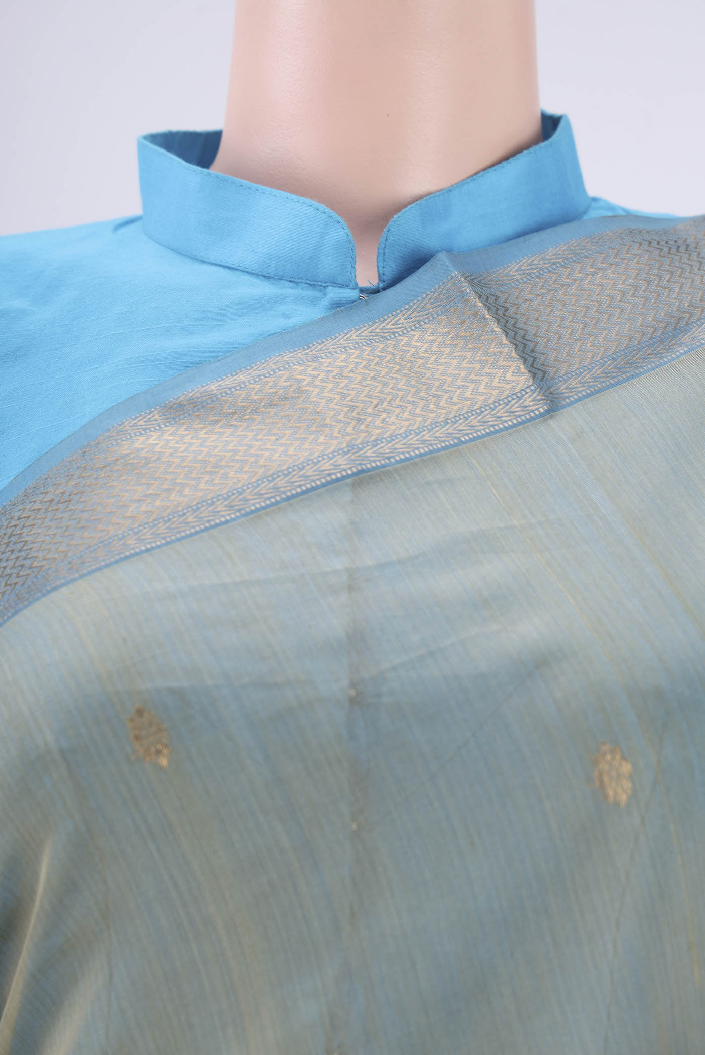 Border image of Sage Green Maheshwari Silk Cotton Saree with Zari Butta on the body and Zari Border. 
