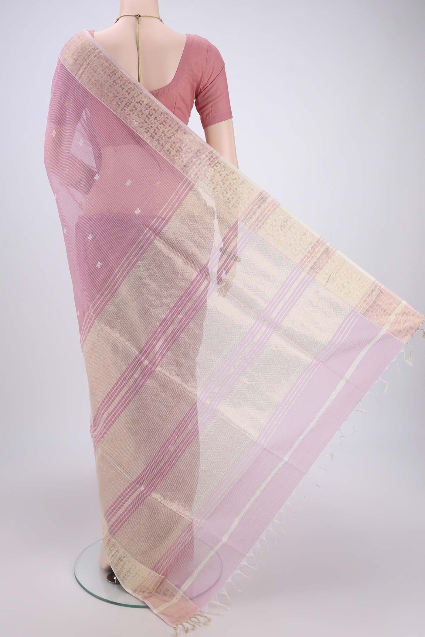 Flat view of Rose pink Maheshwari Silk Cotton Saree with Zari And Thread Butta on the body and Zari And Thread Border. 