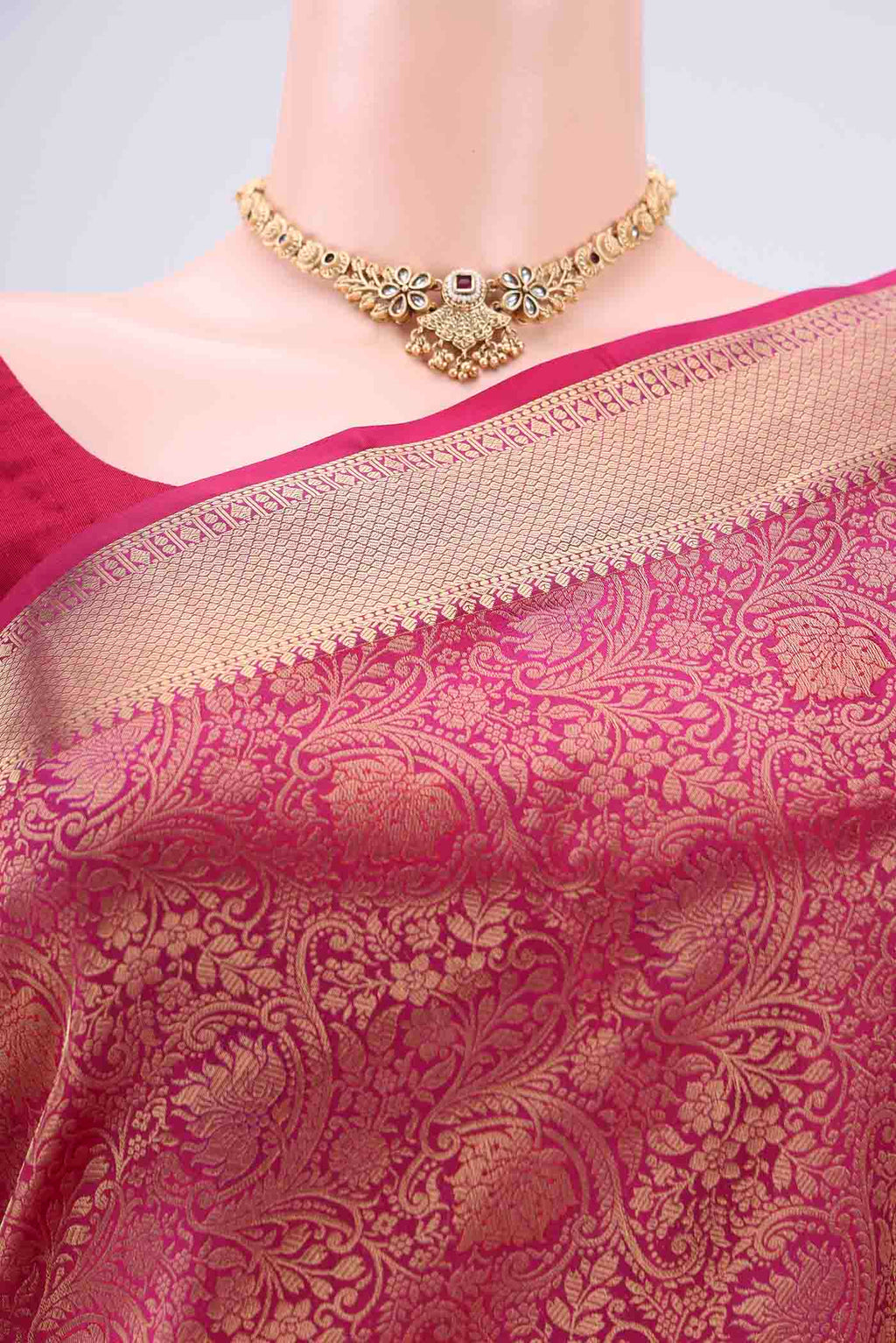Border image of Rani Pink Dual Tone Soft Silk Saree with Zari Brocade on the body and Zari Border. 