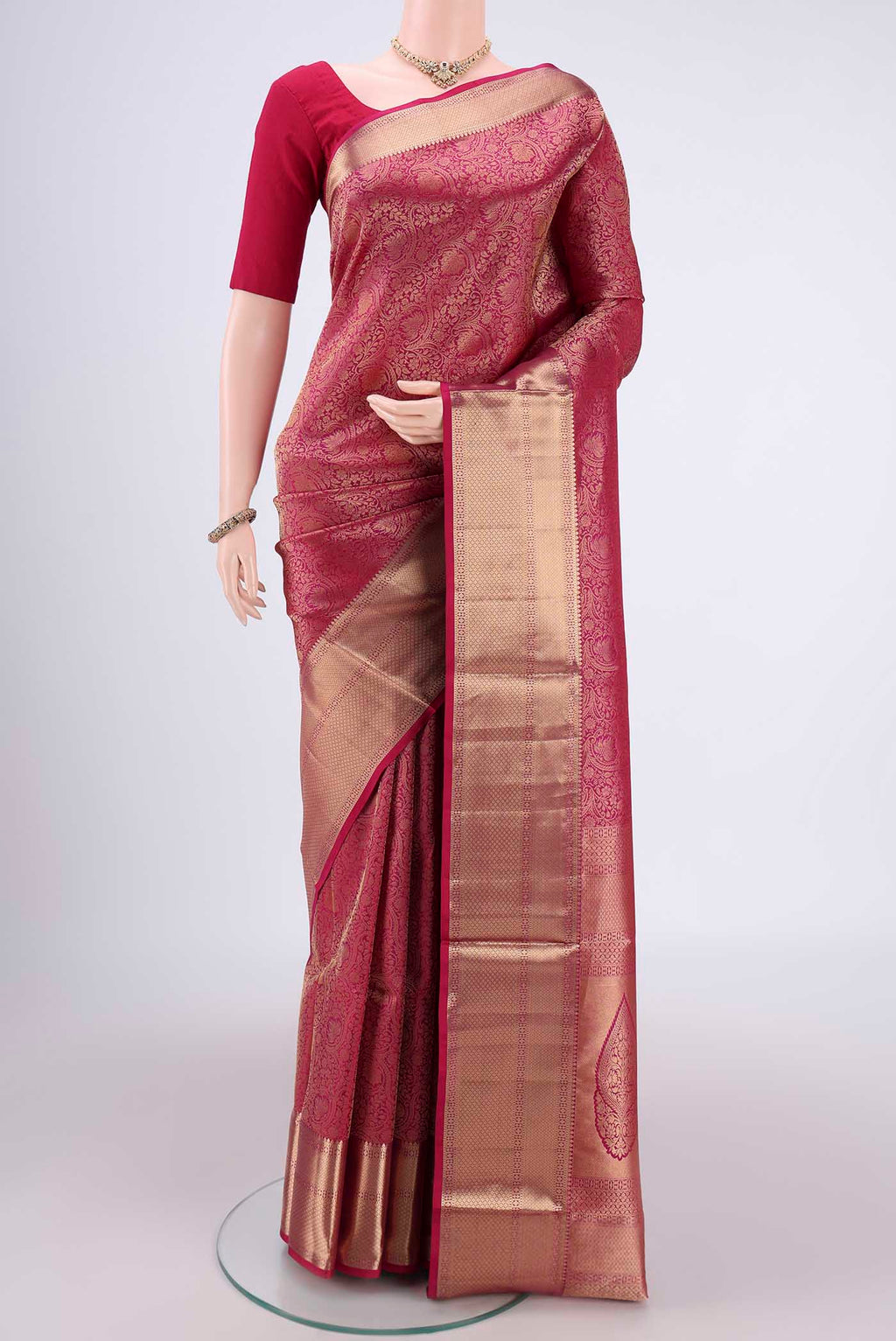 Rani Pink Dual Tone Soft Silk Saree with Zari Brocade on the body and Zari Border.  displayed on a mannequin