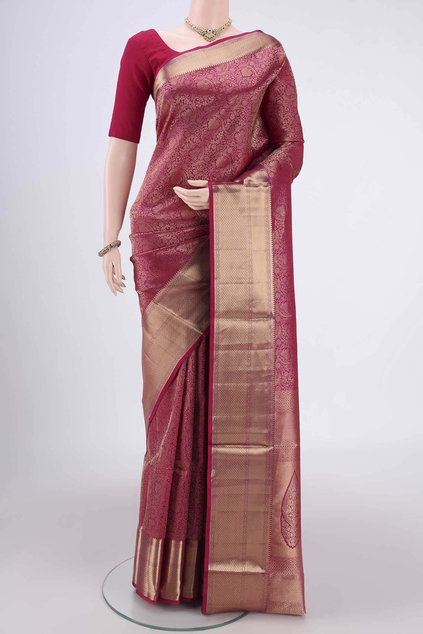 Rani Pink Dual Tone Soft Silk Saree with Zari Brocade on the body and Zari Border.  displayed on a mannequin