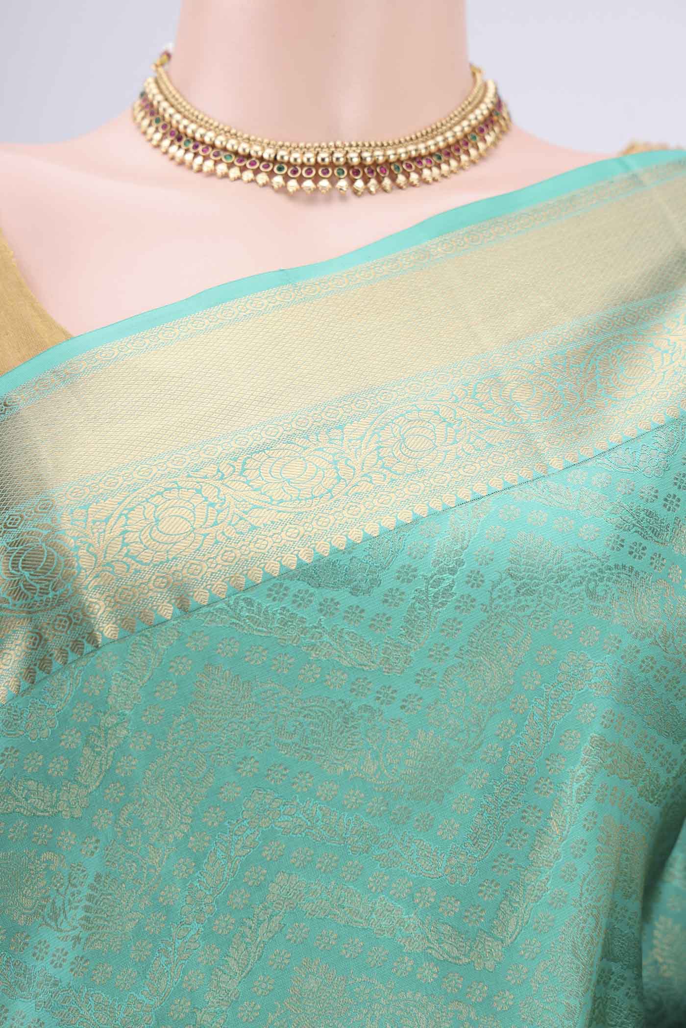 Border image of Sea Green Soft Silk Saree with Zari Brocade on the body and Zari Border. 