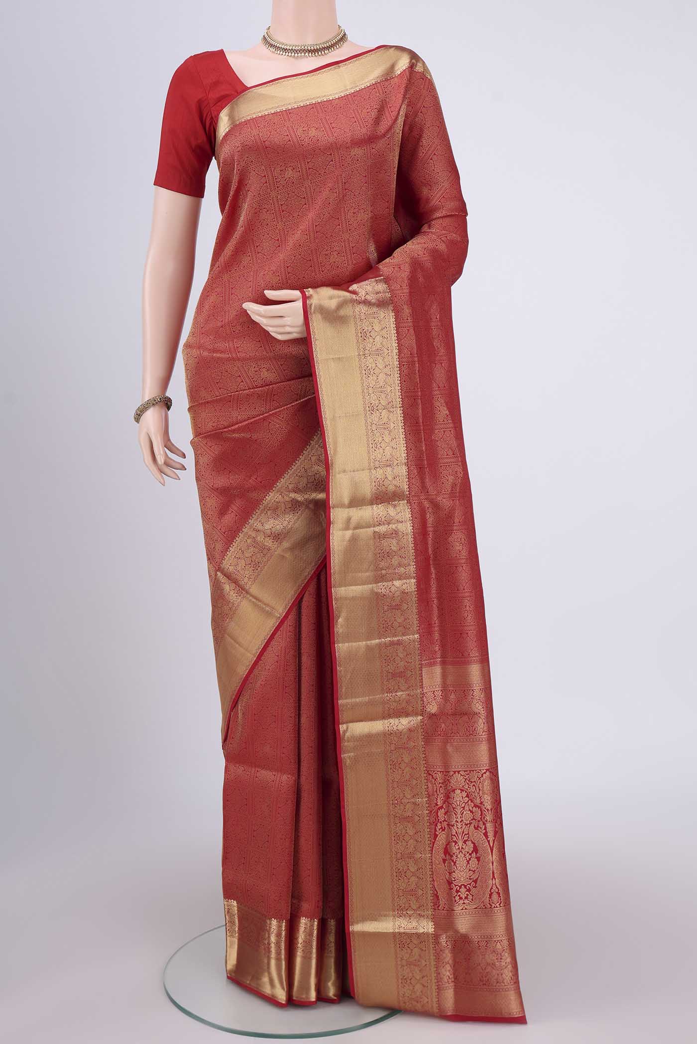 Red Dual Tone Soft Silk Saree with Zari Brocade on the body and Zari Border.  displayed on a mannequin